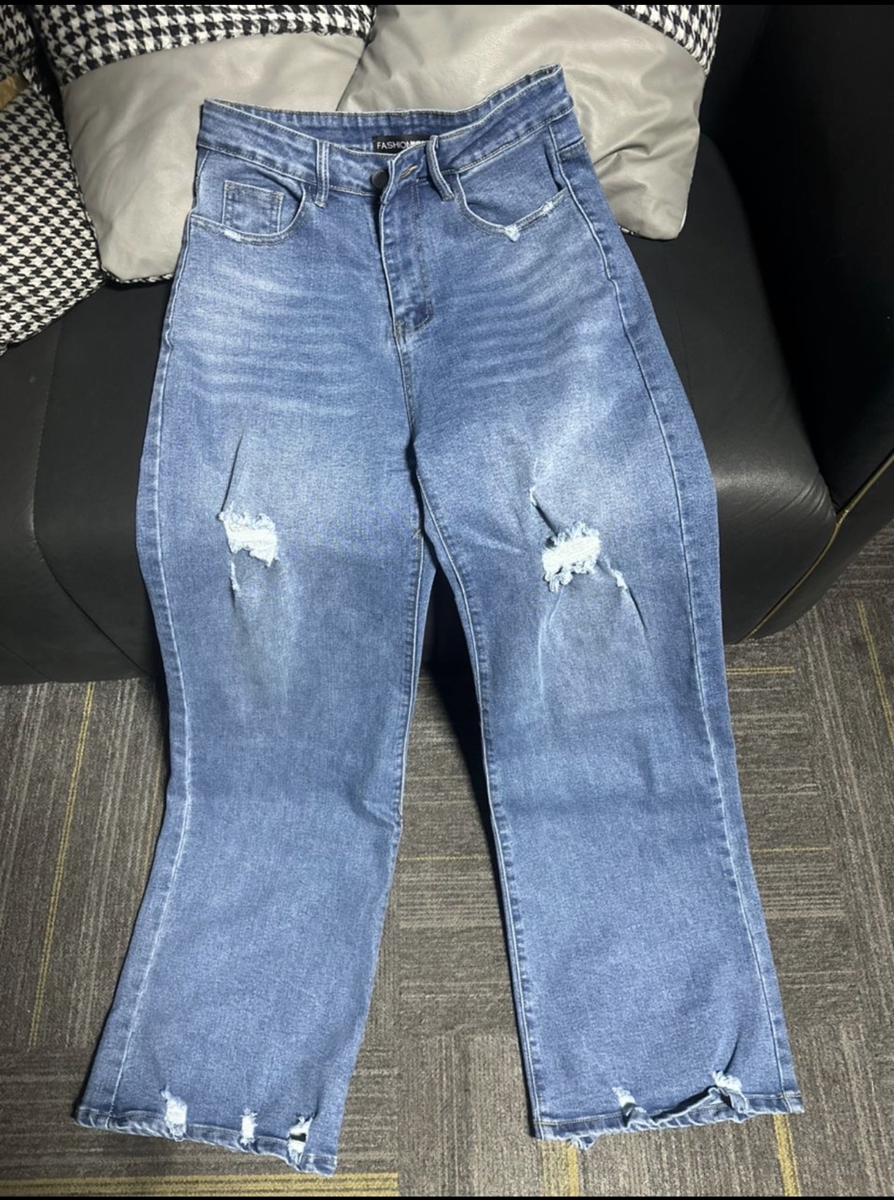 Distressed wide leg denim jeans